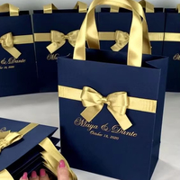 Emballage de sac cadeau Boutique de luxe personnalisé sacs cadeaux de remerciement en papier rose personnalisé avec poignée en ruban de soie imprimé Logo
