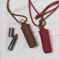 Étui à rouge à lèvres en cuir PU à suspendre au cou, pochette à lèvres portable, porte-gloss avec cordon pour femme, accessoire de maquillage pour le quotidien et les voyages