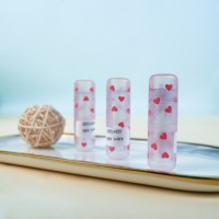 Tube de brillant à lèvres en gros Mini bouteille de rouge à lèvres Matériau ABS avec emballage cosmétique au design coeur rose