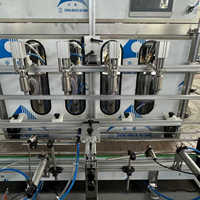 Machine de remplissage automatique de liquides visqueux pour lessive, huile d'olive et huile de palme