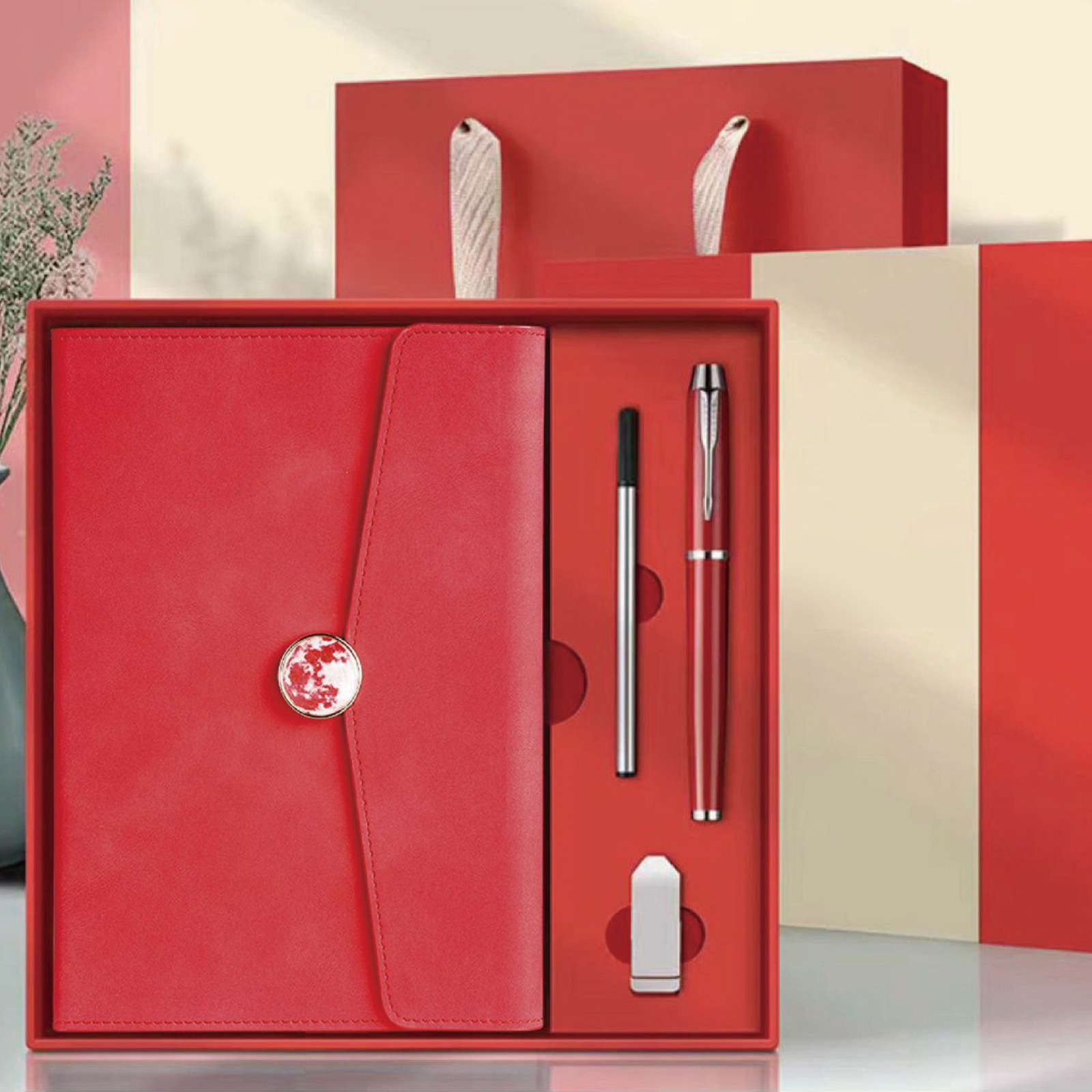 Notebook + Pen + Pen refill + USB drive
