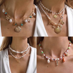Collar de estilo bohemio con conchas marinas y estrellas de mar, ideal para vacaciones en la playa, con cuentas y piedras trituradas, en capas, para llevar alrededor de la clavícula. - Product Image 2
