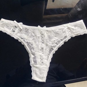 ヨーロッパ系アメリカ人セクシーレース中空ODM下着女性用クロスベルトボウソングローウエストT字型ホットドビー生地7日間サンプル - Product Image 3