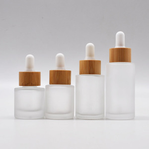 Botella de Vidrio Esmerilado Transparente de 20ml, 30ml, 40ml con Gotero y Tapa de Bambú para Productos de Aromaterapia y Belleza, con Logotipo Personalizado al por Mayor - Product Image 1