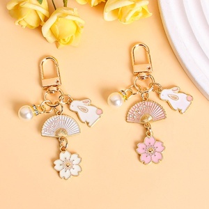 Porte-clés en alliage de zinc motif lapin fleur de cerisier, pendentif pour étui <span class=keywords><strong>AirPods</strong></span>, accessoires de décoration pour sac de <span class=keywords><strong>couple</strong></span> - Product Image 1