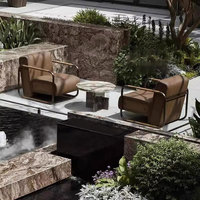 Fauteuil de jardin individuel avec structure en acier inoxydable, coussin en cuir imperméable, ensemble bistrot avec table d'appoint pour villa