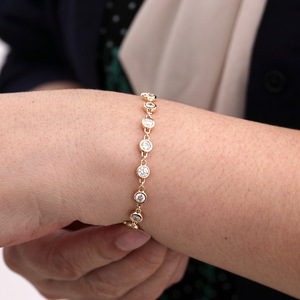 Bracelet tennis en or 14 carats de style européen et américain, avec micro-serti de moissanite simple et polyvalent de 4 mm, bijoux de luxe pour femmes - Product Image 1