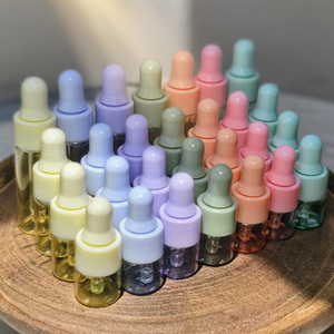 Wholesale Cosmetic Mini Round Colorful Glass <b>Dropper</b> <b>Bottle</b> Empty Essential Oil Face Serum Lotion <b>Bottle</b> 1ml 2ml 3ml 5ml - Product Image 1