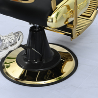 Fauteuil de Barbier Antique Noir et Or en Cuir Capitonnée avec Pompe Hydraulique en Acier Inoxydable et Base Réglable en Hauteur pour Salon de Coiffure
