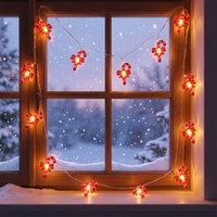 Guirlande lumineuse LED blanc chaud avec ornement en forme de nœud rouge et canne à sucre, câble transparent, fonctionne à piles, pour décoration de Noël