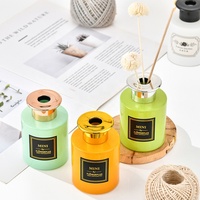 Bouteille vide en verre coloré pour diffuseur de parfum, avec bâtonnets en rotin et fleur de Sola, pour la décoration intérieure