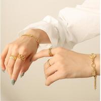 Nouveau bracelet tendance en acier inoxydable plaqué or 18 carats fait main avec pendentif rond, bijoux pour femmes