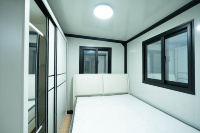 Maison conteneur pliable de 20 pieds à double aile, conteneurs pliables, mini-maison préfabriquée avec salle de bain complète