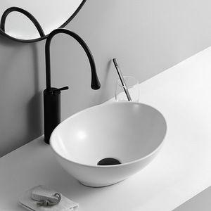 Lavabo de Cerámica Minimalista para Encimera, Forma Cuadrada, de una Sola Pieza, Superficie Lisa Esmaltada, para Baños Pequeños, Área de Lavado de Manos - Product Image 1