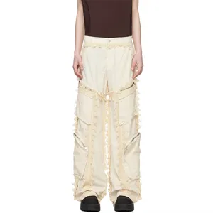 अत्यधिक लोकप्रिय डिस्ट्रेस्ड कॉटन मेश ट्रिम पैंट नायलॉन तफ़ता कार्गो पैंट पुरुषों के लिए आकर्षक बेज गोलाकार कार्गो पैंट