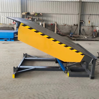 Rampe de nivellement hydraulique fixe pour entrepôt commercial, pour la tâche de chargement de conteneurs par chariot élévateur