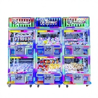 Machine à griffes d'arcade haut de gamme 4 joueurs, grue à poupées multi-stations avec systèmes indépendants pour parcs d'attractions commerciaux