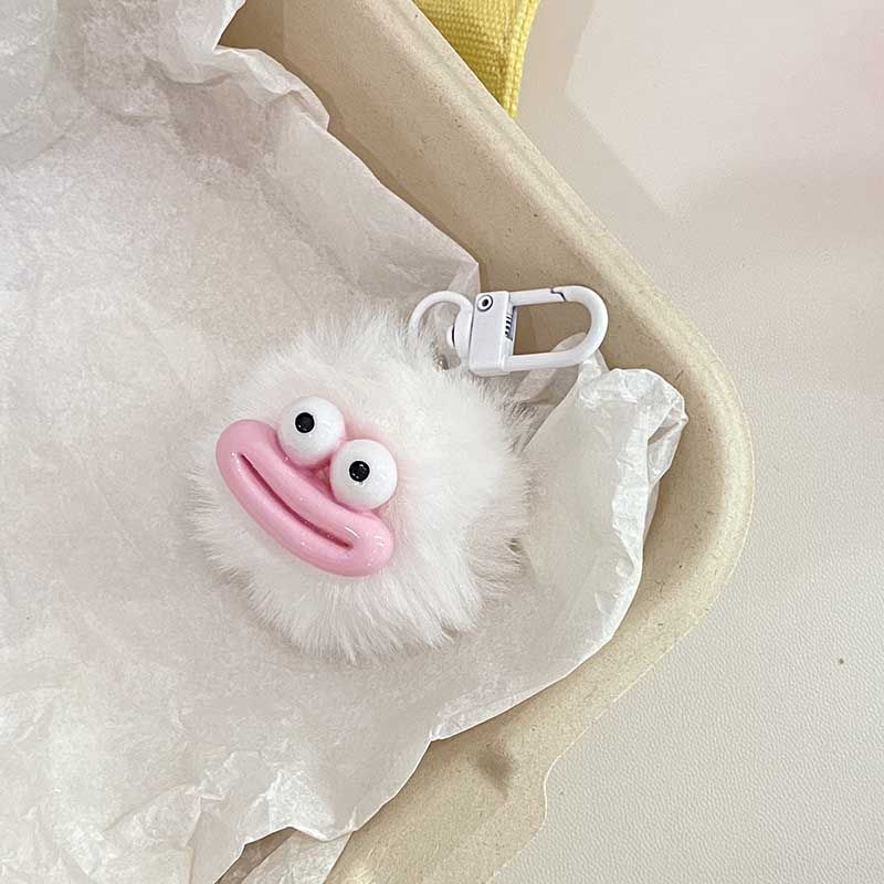 Porte-clés pompon bouche de saucisse blanche