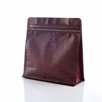 Emballage écologique en étain à fond plat, sachets d'emballage de grains de café compostables personnalisés avec valves et fermetures éclair.
