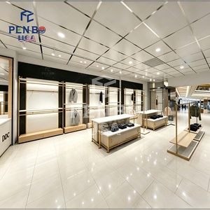 Luxury Gold Wall-Mounted <b>Clothing</b> Rack with <b>Shelves</b> LED Lighting & Adjustable Height- Wood & Metal Retail Display - Product Image 3