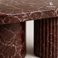 Table basse en pierre naturelle sur mesure avec tambours décalés pour projets hôteliers et villas