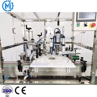 Machine automatique de remplissage et de bouchage de flacons de parfum, de liquides cosmétiques et de vaporisateurs de parfum