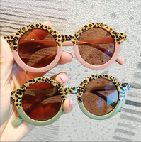 Vente en gros de nouvelles lunettes de soleil rétro à imprimé léopard pour bébés lunettes pour enfants à la mode mignonnes à la mode verres colorés fabriqués en métal PC