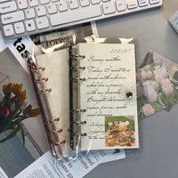 Protège-cahier A5 scintillant en PVC souple transparent avec 6 anneaux ronds or rose et fermeture à bouton-pression pour classeur à feuilles mobiles
