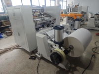 Machine automatique de découpe et de rembobinage de rouleaux de papier thermique pour reçus de distributeurs automatiques et caisses enregistreuses