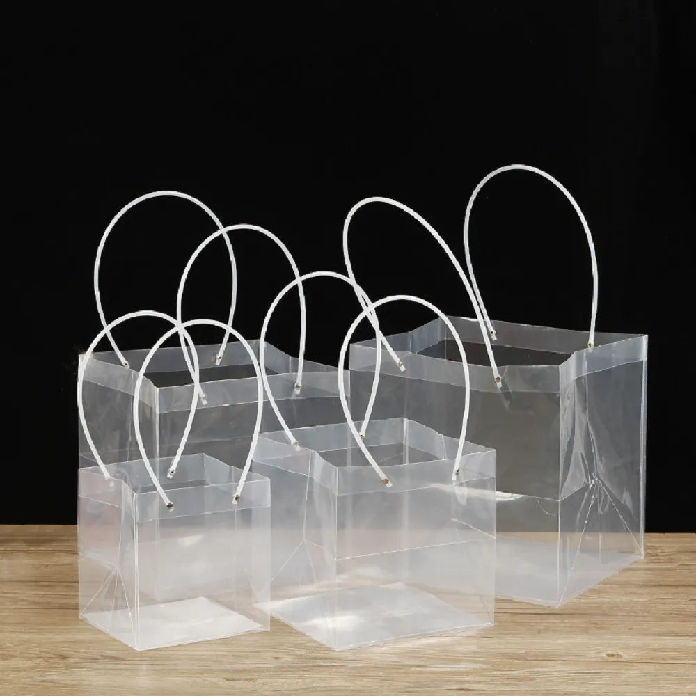 Sac cadeau Transparent en plastique Transparent, sac d'emballage de cadeau de fleur en plastique pour emballage de cadeau de petite entreprise pas cher avec poignée en stock