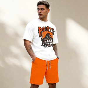 Ensemble T-shirt blanc pour homme avec imprimé dessin animé orange et short orange, style streetwear, tenue d'été, col rond, coton tricoté - Product Image 1