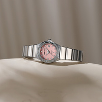 Montre pour femme en acier inoxydable de luxe avec logo personnalisé, mouvement à quartz original, aiguilles lumineuses, échelle de diamants, date, pour femmes