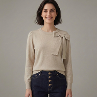 Pull en maille à nœud sur l'épaule pour femme, manches longues, col rond, couleur unie, épaules bouffantes, style bureau, preppy, coquette, vente en gros