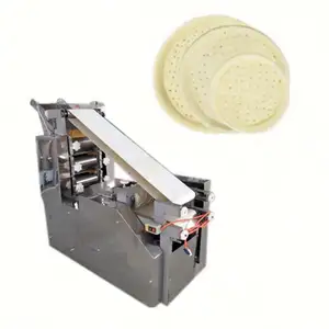 A máquina industrial do fabricante do pão do uso home pita faz a tortilla cozida