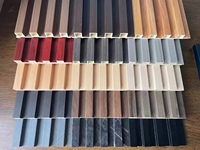Revêtement mural creux en bois composite WPC Panneau mural cannelé en PVC ignifugé à grain de bois WPC Grand panneau mural et tubes de plafond