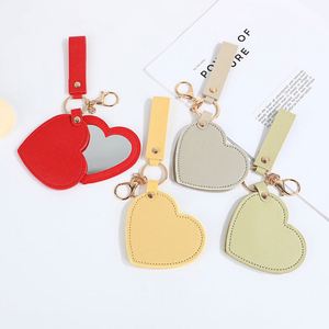 Espejo de Maquillaje Portátil de Cuero PU con Forma de Corazón Rosa - Espejo de Viaje Bonito con Llavero para Niñas - Product Image 1