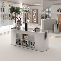 Vitrine moderne pour magasin de vêtements avec présentoir à lumière Vitrine à vêtements