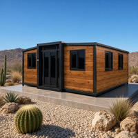 Maison conteneur de luxe extensible, préfabriquée, avec planches de bois et structure noire, pour villas de villégiature désertique Xeriscape, fournisseur d'usine en gros