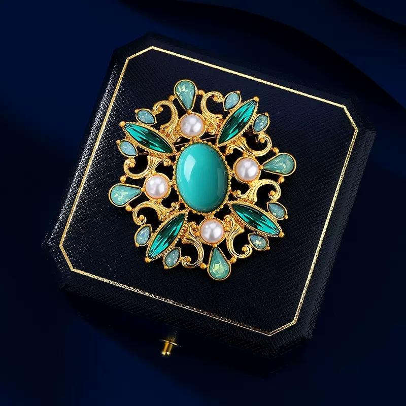 Relief Emerald Brooch