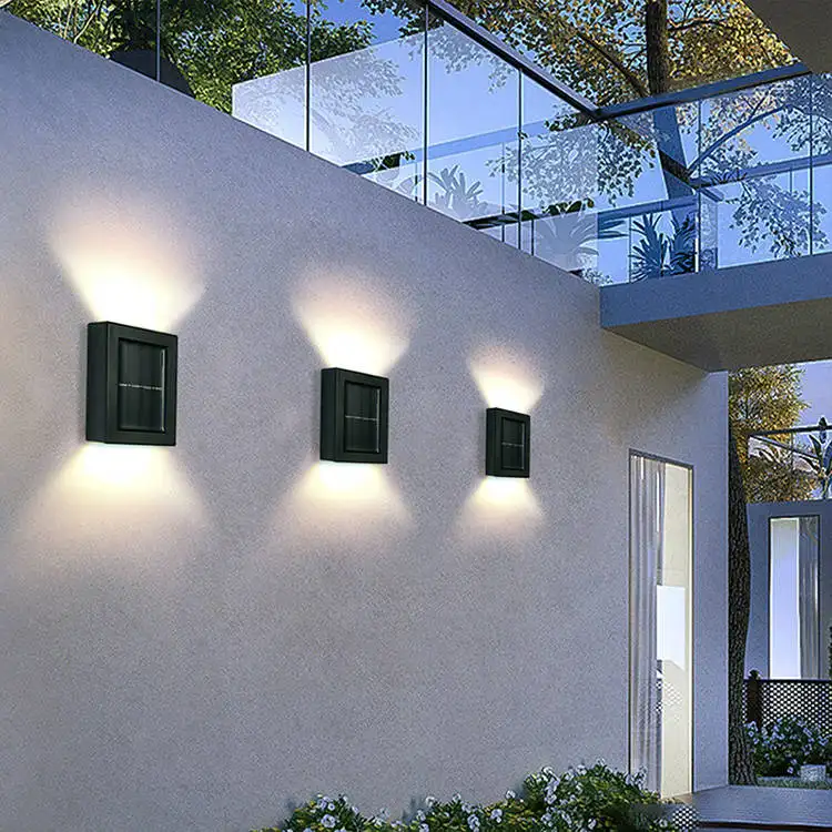 LED güneş duvar lambası dış mekan sundurma bahçe su geçirmez duvar lambası güneş ışıkları yukarı ve aşağı ışık avlu merdiven dekorasyon