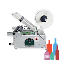 2025 Étiqueteuse de bouteilles semi-automatique Imprimante de code de date Étiqueteuse manuelle à manchon thermorétractable Matériau d'emballage en bois