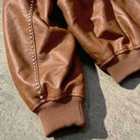 Veste bomber personnalisée avec rivets de la marque Ouna Clothing Manufacturer, veste entièrement zippée, veste en cuir surdimensionnée et chaude