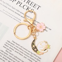 Nouveau porte-clés en métal de dessin animé bricolage mignon petit lapin fleur de cerisier frais porte-clés sac pendentif cadeau pour fille
