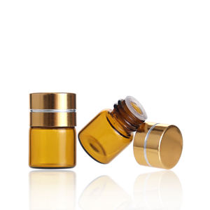 Pequeño frasco redondo de vidrio ámbar para aceites esenciales, cosméticos, vacío, de 1 ml, con tapa de rosca de aluminio dorado y plástico. - Product Image 6