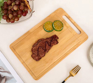 <span class=keywords><strong>Planche</strong></span> à découper multifonctionnelle double face <span class=keywords><strong>en</strong></span> <span class=keywords><strong>bois</strong></span> massif <span class=keywords><strong>de</strong></span> bambou avec poignée - Product Image 4