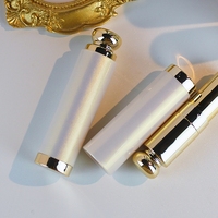 Jinze prêt à expédier Tubes de rouge à lèvres de couleur Hotsale Conteneurs de rouge à lèvres vides ronds verts avec options de marque privée