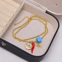 Nouveauté : Collier tendance en cuivre plaqué or avec pendentif zircon étincelant en forme de piment et de mauvais œil, cadeau pour femme