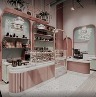 Nouvelle vitrine de café rose à la mode avec éclairage LED Design intérieur élégant pour les magasins de bonbons et les cafés