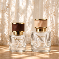 Flacon de parfum en verre de luxe 50 ml avec logo personnalisé, bouchon noir et or, flacon de parfum vide, emballage en gros OEM ODM