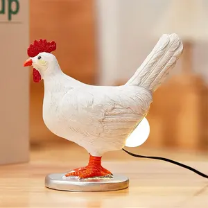 चिकन अंडे की दीपक प्रतिमा मजाकिया जीवन रेसिन चिकन रात को रोशनी में चिकन एक चमकदार अंडे का ईस्टर उपहार घर शिल्प सजावट देता है।